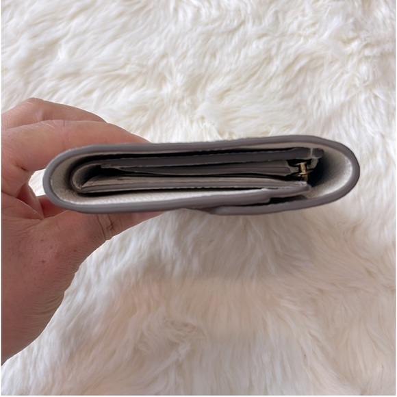 Louis Vuitton Empreinte Neige Wallet curieuse - Picture 11 of 13